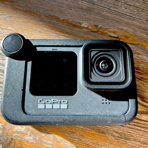 GoPro 9 with booster microphone and case.